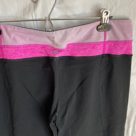 Lululemon Astro workout pants with pink waistband trim. Size 12 - Picture 2 of 3